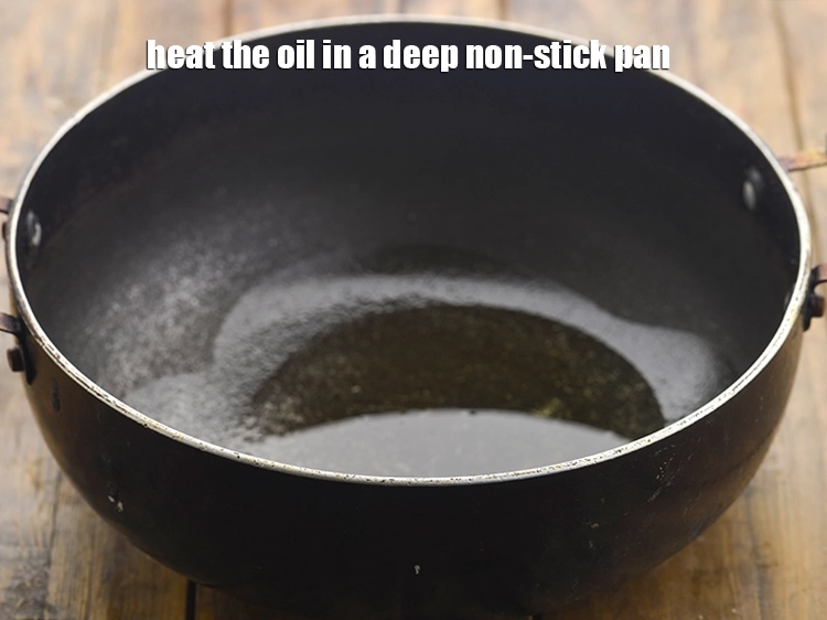 Step 12 – <p>Heat the oil in a deep non-stick pan.</p>