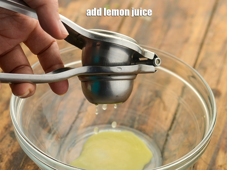 Step 14 – <p>To this we have to add lemon juice. For that cut the lemon into 2 …