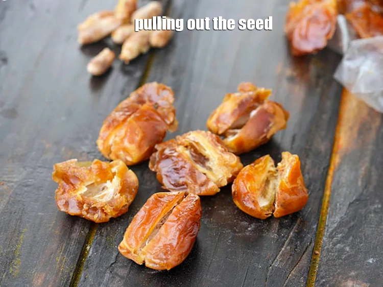 Step 4 – <p>Wash the dates well with water, drain and&nbsp;<strong>deseed each date fruit by carefully slitting on …