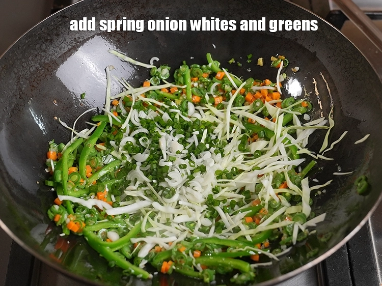 Step 39 – <p>Add ½ cup finely chopped spring onion whites and greens.&nbsp;</p>