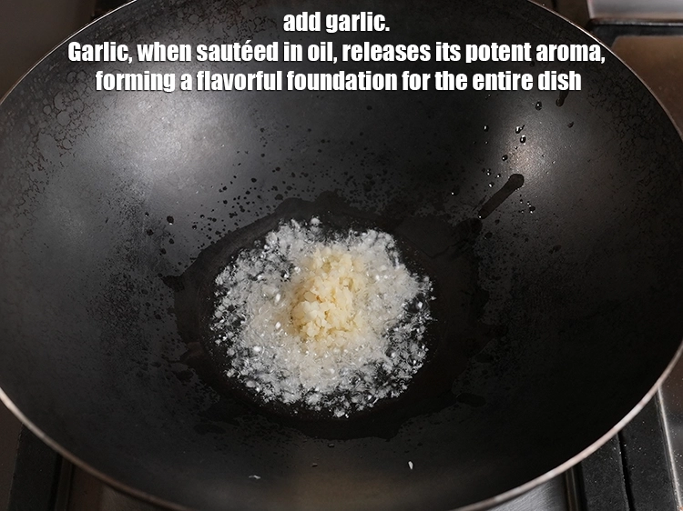 Step 30 – <p>Add 2 tbsp finely chopped garlic. Garlic, when sautéed in oil, releases its potent aroma, …