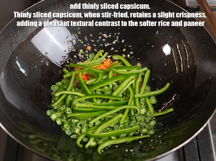Step 36 – <p>Add ½ cup thinly sliced capsicum. Thinly sliced capsicum, when stir-fried, retains a slight crispness, …