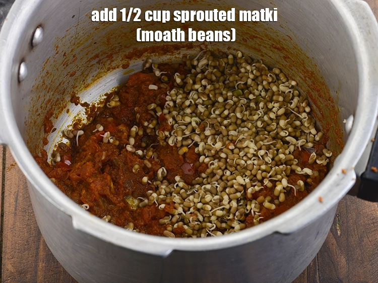 Step 20 – <p>Add the matki sprouts. The matki is soaked overnight in enough water, then drained and …