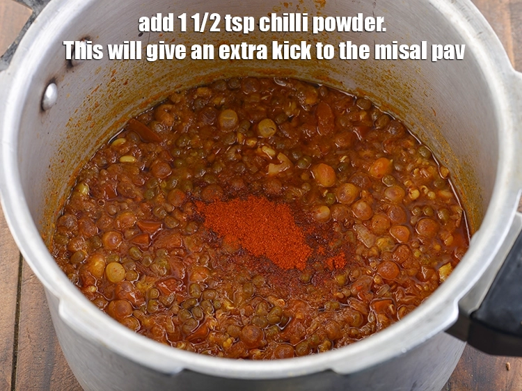 Step 27 – <p>Add the chilli powder. This will give an extra kick to the misal pav.</p>
