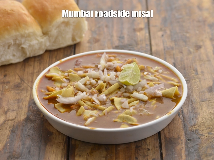 Step 42 – <p>This is how the&nbsp;<strong>Mumbai roadside</strong>&nbsp;<strong>misal</strong>&nbsp;looks with usal, sev, gathiya, chopped onions and sliced lime and …