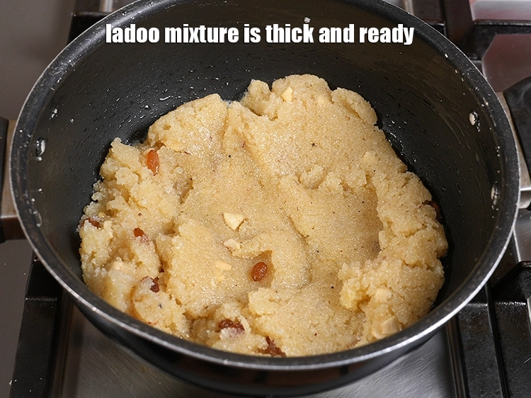 Step 19 – <p><span style="background-color:rgb(255,255,255);color:rgb(0,0,0);">The Coconut Rava Ladoo mixture is thick and ready.</span></p>