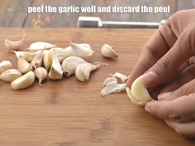 Step 4 – <p>Peel the garlic well and discard the peel.</p>