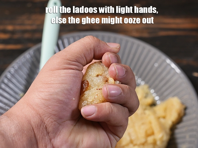 Step 25 – <p>Roll the ladoos with light hands, else the ghee might ooze out.</p>