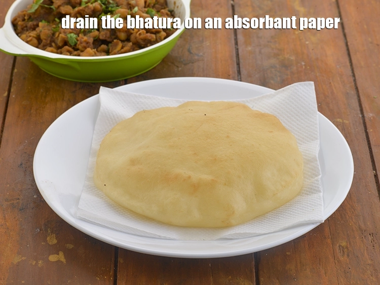 Step 21 – <p><span style="background-color:rgb(255,255,255);color:rgb(0,0,0);">Drain the&nbsp;</span><strong>bhatura | bhatura with yeast | Punjabi bhatura |&nbsp;</strong><span style="background-color:rgb(255,255,255);color:rgb(0,0,0);">on an absorbant paper.</span></p>