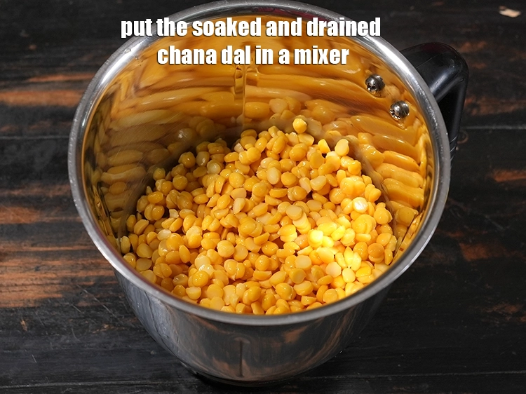 Step 8 – <p>Put the soaked and drained chana dal in a mixer. <span style="color:rgb(0,0,0);">Chana dal, when soaked …