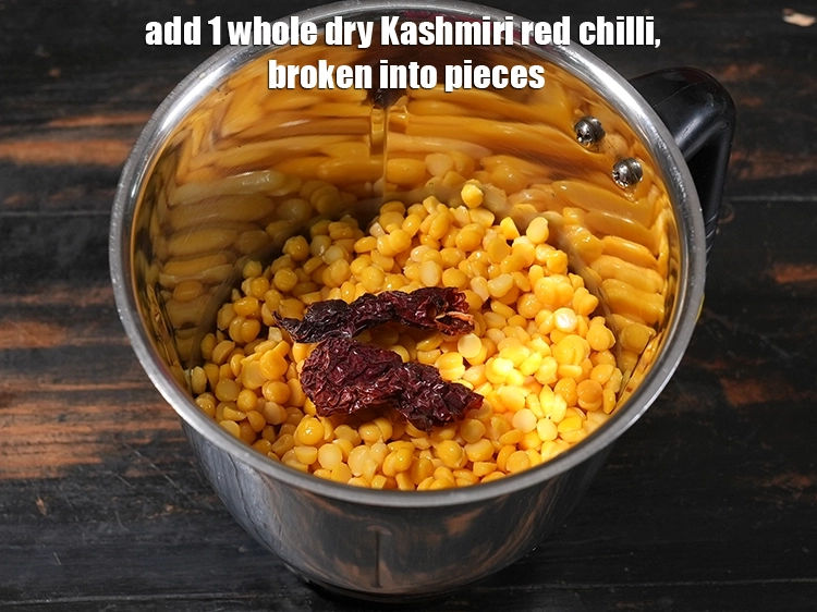 Step 9 – <p>Add 1 <a href="/glossary-whole-dry-kashmiri-red-chillies-kashmiri-mirch-kashmiri-lal-mirch-332i"><u>whole dry Kashmiri red chilli </u></a>, broken into pieces. <span style="color:rgb(0,0,0);">Kashmiri red …