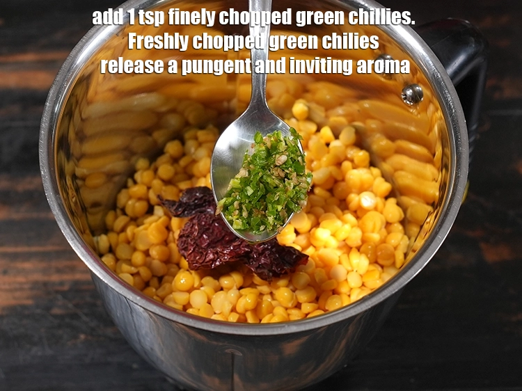 Step 10 – <p>Add 1 tsp finely <a href="/glossary-green-chillies-hari-mirch-331i#ing_2388"><u>chopped green chillies</u></a><u>. </u><span style="color:rgb(0,0,0);">Freshly chopped green chilies release a …