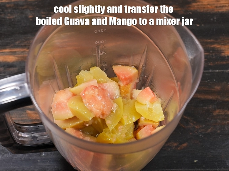 Step 7 – <p>Cool slightly and transfer the boiled Guava and Mango to a mixer jar.&nbsp;</p>