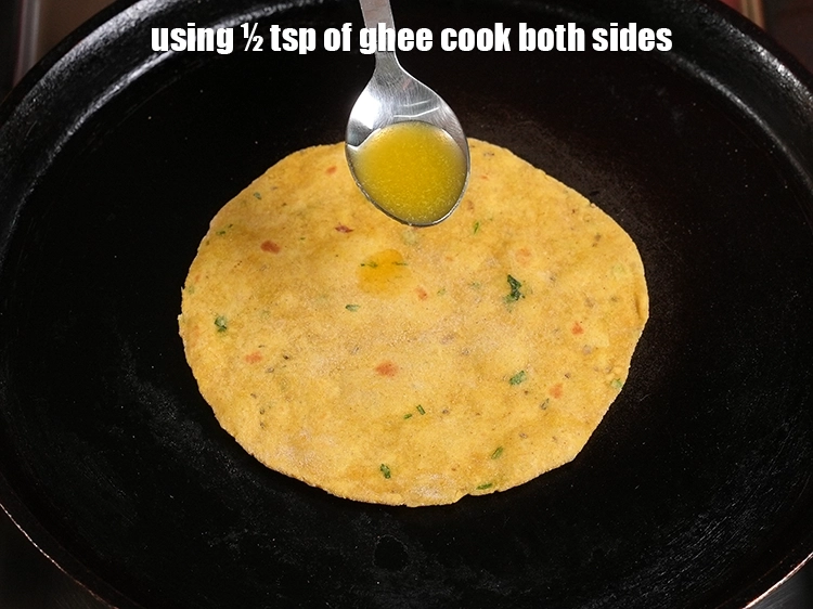 Step 16 – <p><span style="background-color:rgb(255,255,255);color:rgb(0,0,0);">Using ½ tsp of ghee cook both sides.</span></p>