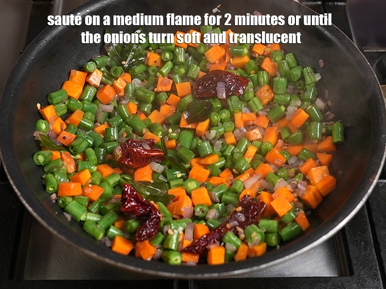 Step 17 – <p>Sauté on a medium flame for 2 minutes or until the onions turn soft and …