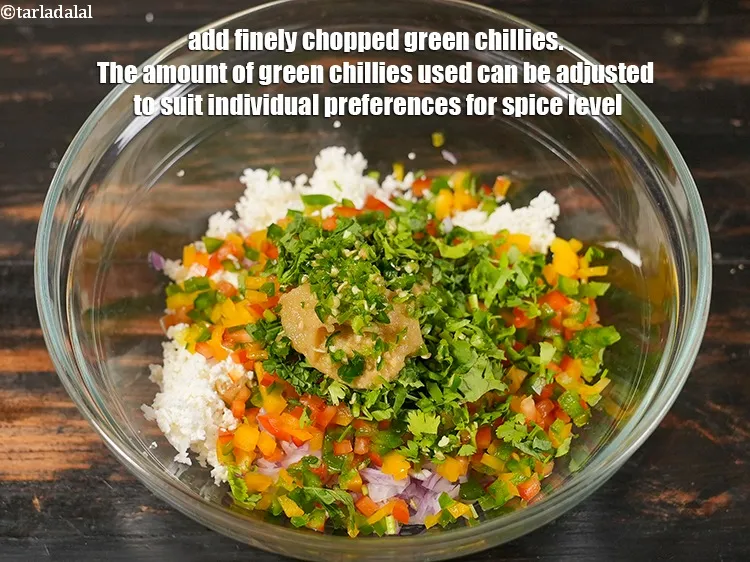 Step 10 – <p>Add 1 tsp finely <a href="https://www.tarladalal.com/glossary-chopped-green-chilli-820i">chopped green chillies</a>. The amount of green chillies used can …