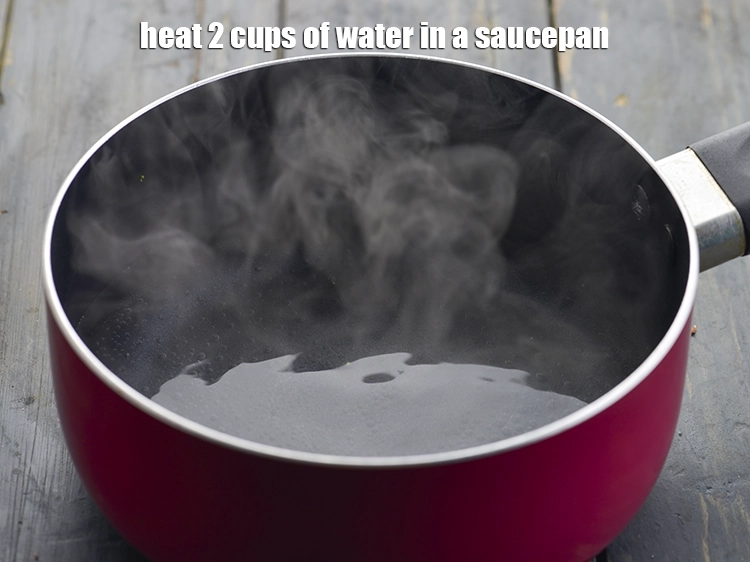 Step 2 – <p>To make the<strong> Kashmiri kahwa</strong> recipe, heat 2 cups of water in a saucepan. Traditionally, …