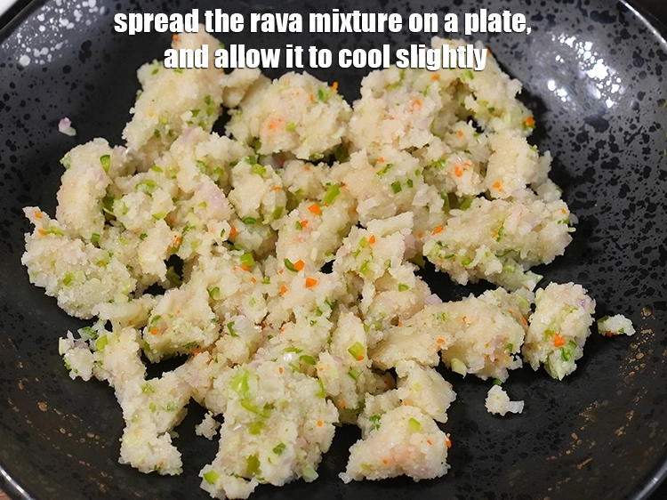 Step 14 – <p><span style="background-color:rgb(255,255,255);color:rgb(34,34,34);">Spread the rava mixture on a plate, and allow it to cool slightly.</span></p>