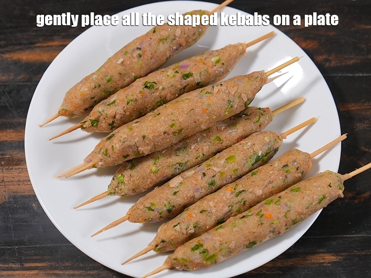 Step 25 – <p><span style="background-color:rgb(255,255,255);color:rgb(34,34,34);">Gently place all the shaped kebabs on a plate.</span></p>