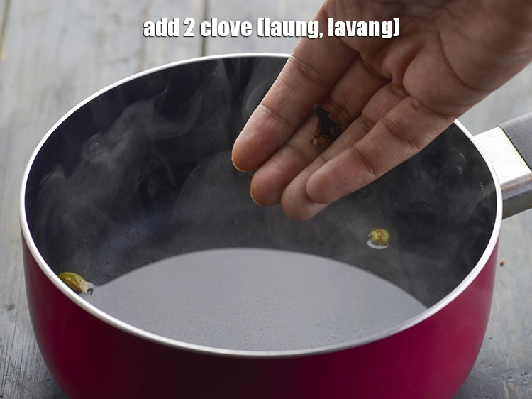 Step 5 – <p>Add the <span style="background-color:rgb(255,255,255);color:rgb(0,0,0);">2 </span><a href="https://www.tarladalal.com/glossary-cloves-laung-lavang-322i"><u>clove (laung / lavang)</u></a>. If you have, then you can …