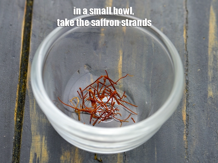 Step 7 – <p>While the&nbsp;<strong>Kashmiri kahwa</strong>&nbsp;is boiling, in a small bowl, take the <span style="background-color:rgb(255,255,255);color:rgb(0,0,0);">1/4 tsp </span><a href="https://www.tarladalal.com/glossary-saffron-kesar-520i"><u>saffron …