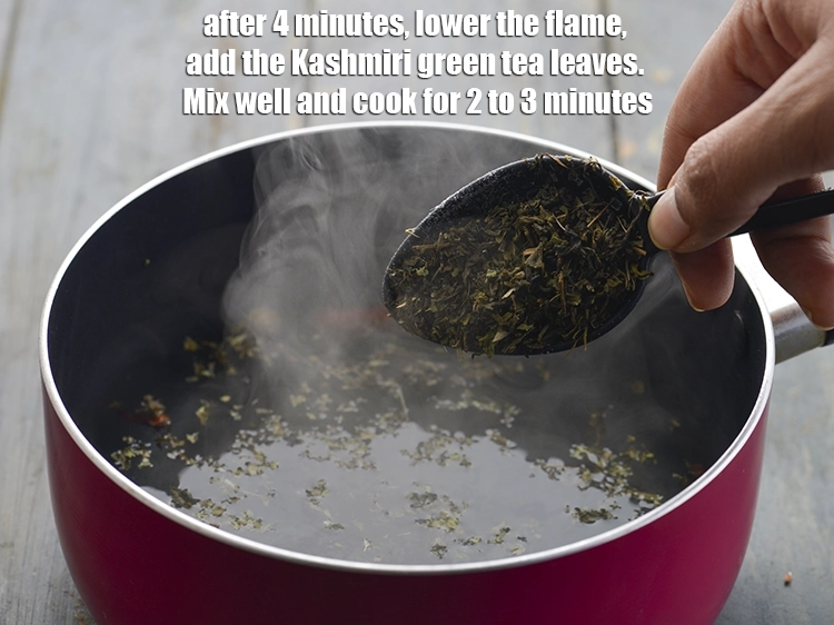 Step 9 – <p>After 4 minutes, lower the flame, add the <span style="background-color:rgb(255,255,255);color:rgb(0,0,0);">4 tsp </span><a href="https://www.tarladalal.com/glossary-Kashmiri-green-tea-leaves-kashmiri-chai-ki-patti-2615i"><u>Kashmiri green tea …
