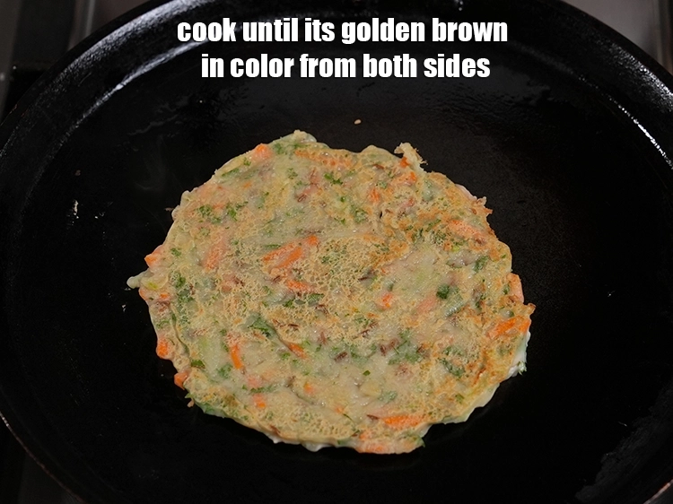 Step 18 – <p><span style="background-color:rgb(255,255,255);color:rgb(34,34,34);">Cook until its golden brown in color from both sides.</span></p>