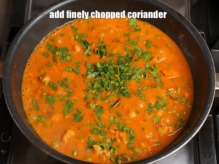 Step 38 – <p><span style="background-color:rgb(255,255,255);color:rgb(0,0,0);">Add 2 tbsp </span><a href="https://www.tarladalal.com/glossary-coriander-dhania-kothmir-369i#ing_3500"><u>finely chopped coriander</u></a>. <span style="background-color:rgb(255,255,255);color:rgb(0,0,0);">Mix well.</span></p>