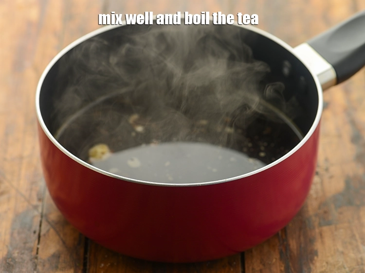 Step 6 – <p>Mix well and boil the tea. Simmer on a medium flame for 3 minutes or …