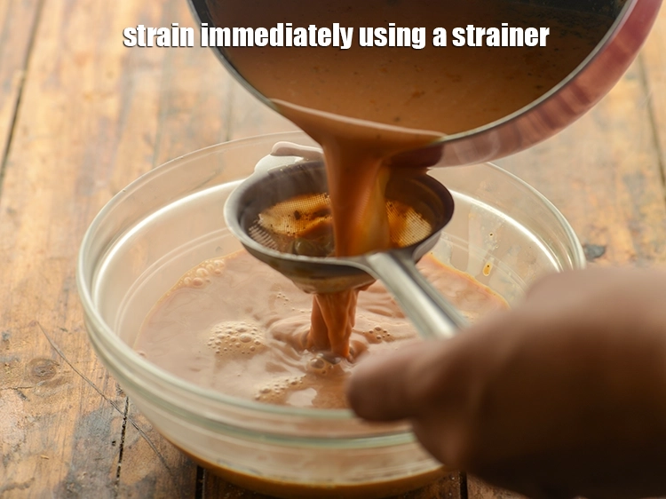 Step 9 – <p>Strain immediately using a strainer and discard the tea powder mixture.</p>