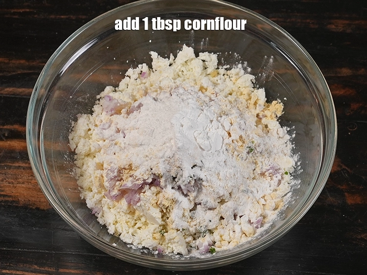 Step 7 – <p>Add <span style="background-color:rgb(255,255,255);color:rgb(0,0,0);">1 tbsp </span><a href="https://www.tarladalal.com/glossary-cornflour-cornstarch-maize-starch-corn-flour-112i"><u>cornflour</u></a><u>.</u><span style="background-color:rgb(255,255,255);color:rgb(0,0,0);">They bind together all the ingredients very well.</span></p>