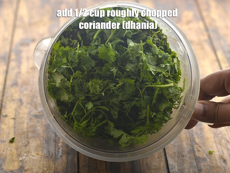Step 21 – <p>Add 1/2 cup roughly <a href="/glossary-coriander-dhania-kothmir-369i#ing_2365"><u>chopped coriander (dhania)</u></a> to it. <strong>Flavor Enhancement:</strong> Coriander offers a …