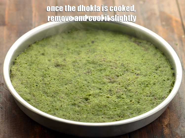 Step 40 – <p><span style="background-color:rgb(255,255,255);color:rgb(0,0,0);">Once the dhokla is cooked, remove and cool it slightly.</span></p>