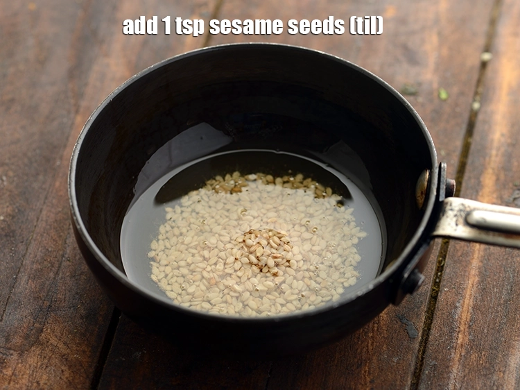 Step 16 – <p>Once the oil is hot, add the sesame seeds.</p>