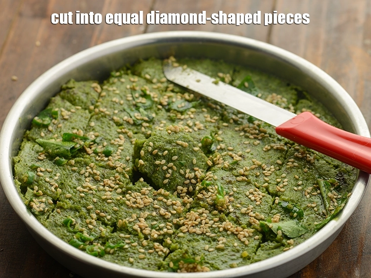Step 21 – <p>Cool slightly and cut into equal diamond-shaped pieces. Cool the dhoklas for just about 30 …