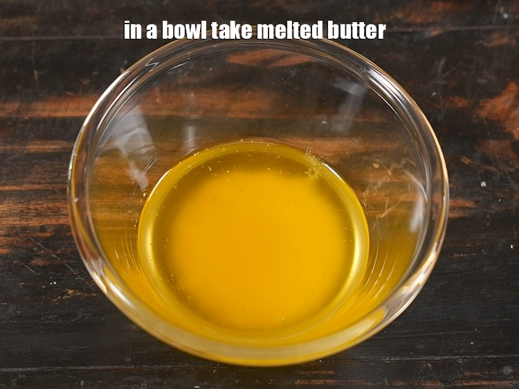 Step 11 – <p>To make a spread for stuffed cheesy schezuan pav, in a bowl take melted butter. …