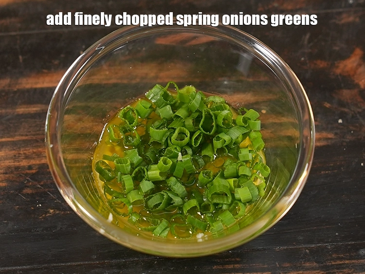 Step 29 – <p>It is important to chop the spring onion greens finely so they spread easily and …