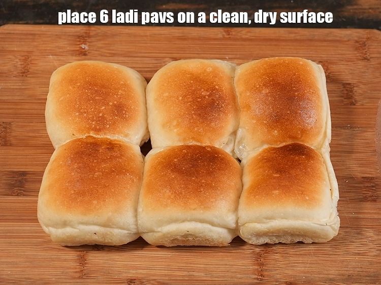 Step 15 – <p>To make stuffed cheesy schezuan pav, place 6 ladi pavs on a clean, dry surface.</p>