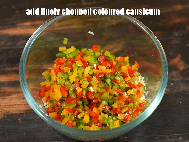 Step 3 – <p>Add finely chopped capsicum. We have used all three viz. red, yellow, green to get …