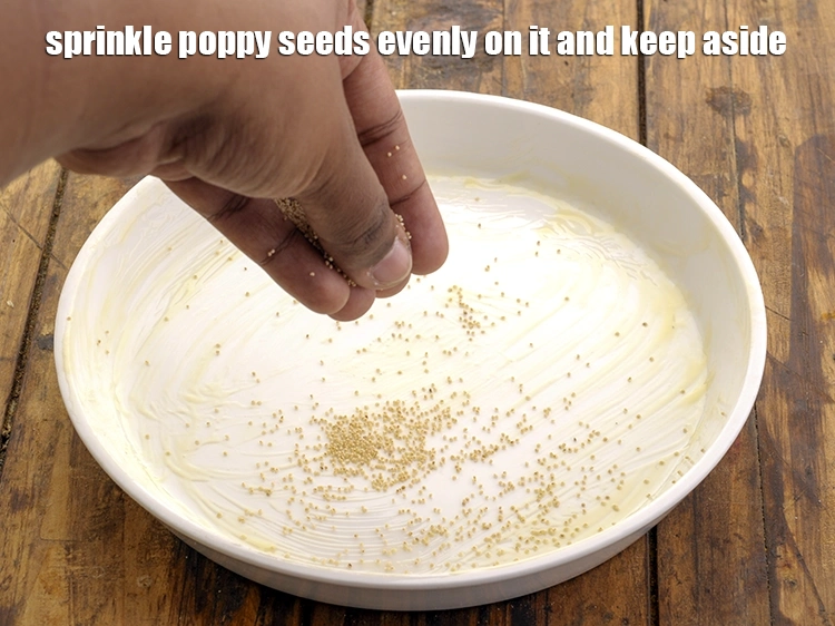 Step 3 – <p>Sprinkle <a href="https://www.tarladalal.com/glossary-poppy-seeds-khus-khus-589i"><u>poppy seeds (khus-khus)</u></a> evenly on it and keep aside.</p>