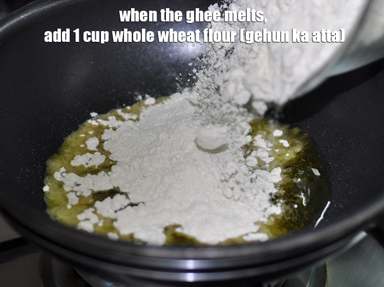 Step 5 – <p>When the ghee melts, add <span style="background-color:rgb(255,255,255);color:rgb(0,0,0);">1 cup </span><a href="https://www.tarladalal.com/glossary-whole-wheat-flour-gehun-ka-atta-gehun-ka-aata-429i"><u>whole wheat flour (gehun ka atta)</u></a>.</p>
