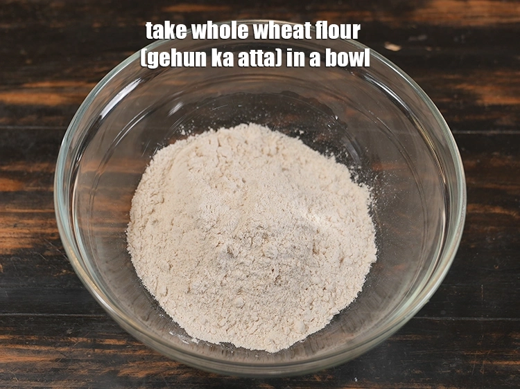 Step 2 – <p>For the <strong>dough of raw papaya paratha</strong>, take <span style="background-color:rgb(255,255,255);color:rgb(0,0,0);">3/4 cup </span><a href="https://www.tarladalal.com/glossary-whole-wheat-flour-gehun-ka-atta-gehun-ka-aata-429i"><u>whole wheat flour …