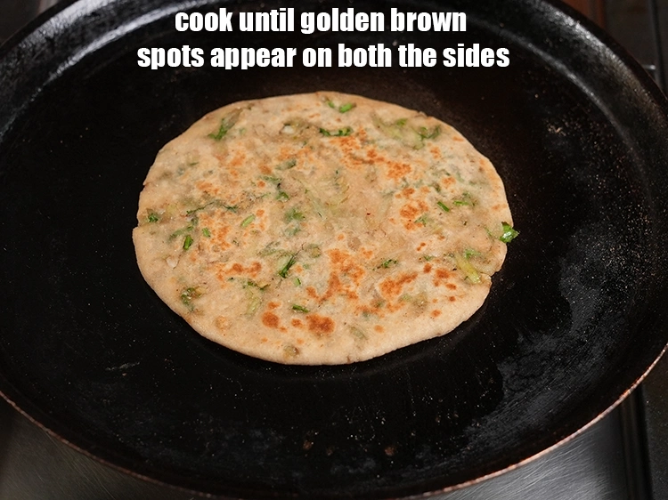 Step 31 – <p>Cook until golden brown spots appear on both the sides.</p>