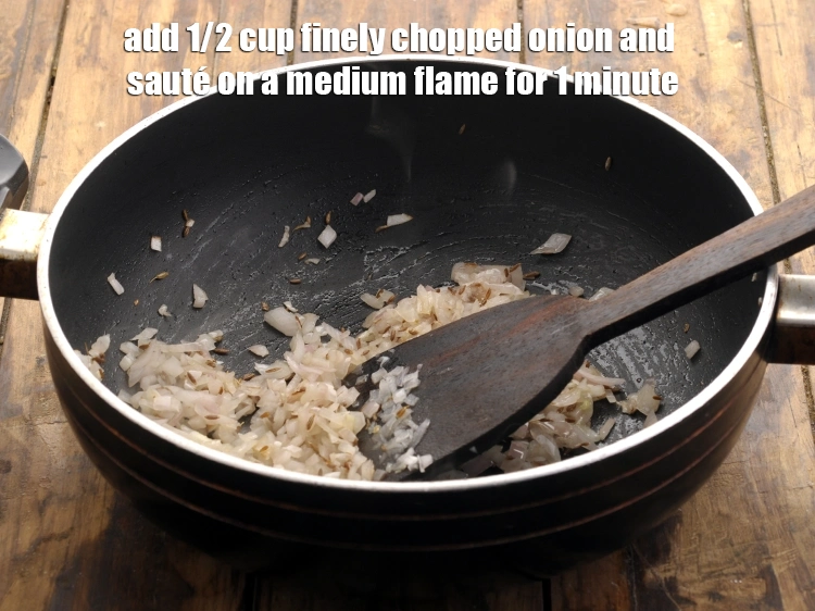 Step 19 – <p>Add onions and sauté on a medium flame for 1 minute.</p>