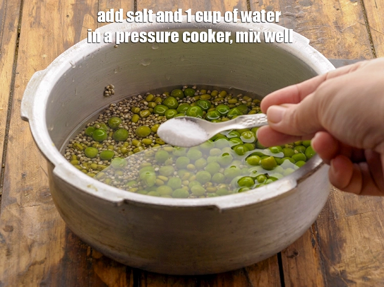 Step 13 – <p>Add salt and 1 cup of water in a pressure cooker, mix well.</p>