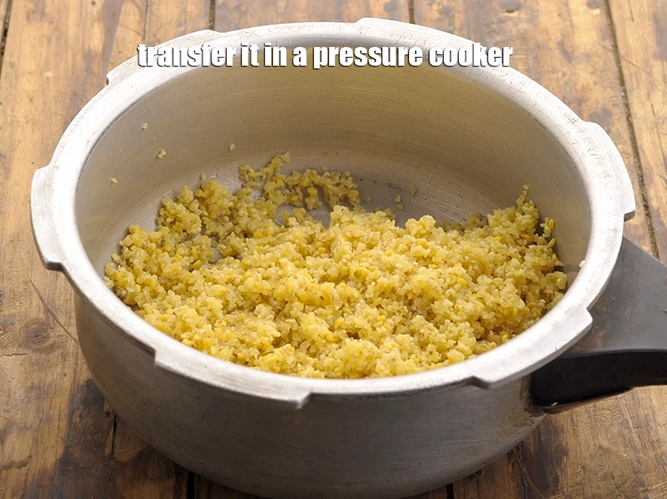 Step 10 – <p>Transfer it in a pressure cooker.</p>
