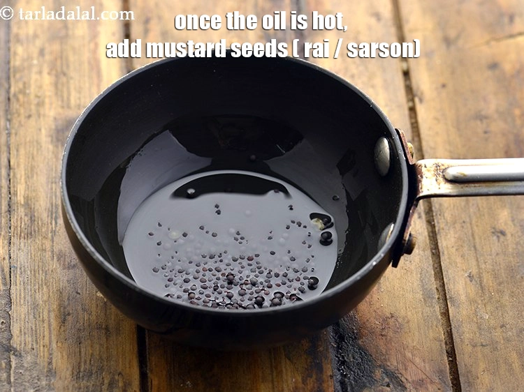 Step 13 – <p>Once the oil is hot, add <span style="background-color:rgb(255,255,255);color:rgb(0,0,0);">1/4 tsp </span><a href="https://www.tarladalal.com/glossary-mustard-seeds-sarson-rai-sarson-ke-beej-525i"><u>mustard seeds ( rai / …