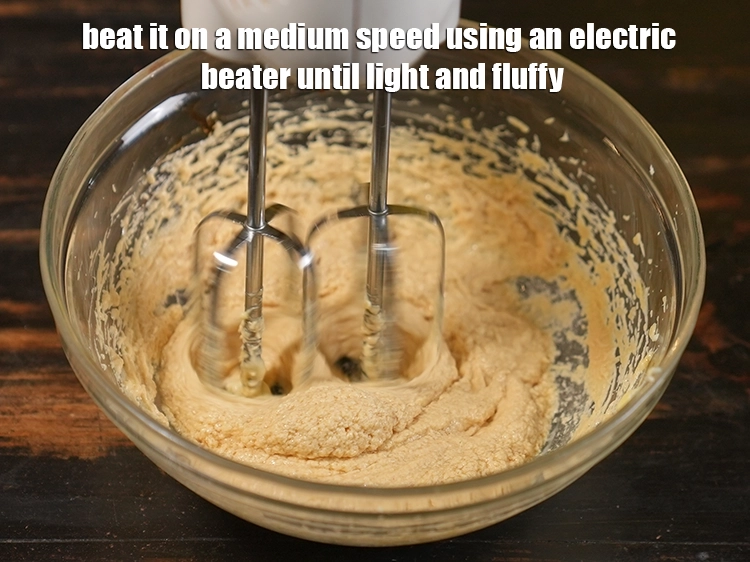 Step 70 – <p>Again, beat it on a medium speed using an electric beater until light and fluffy.</p>