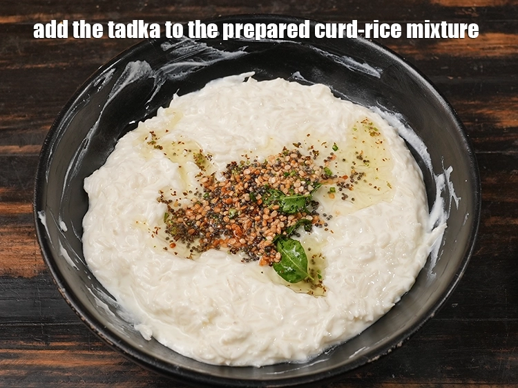 Step 14 – <p><span style="background-color:rgb(255,255,255);color:rgb(0,0,0);">Add the tadka to the prepared curd-rice mixture.</span></p>