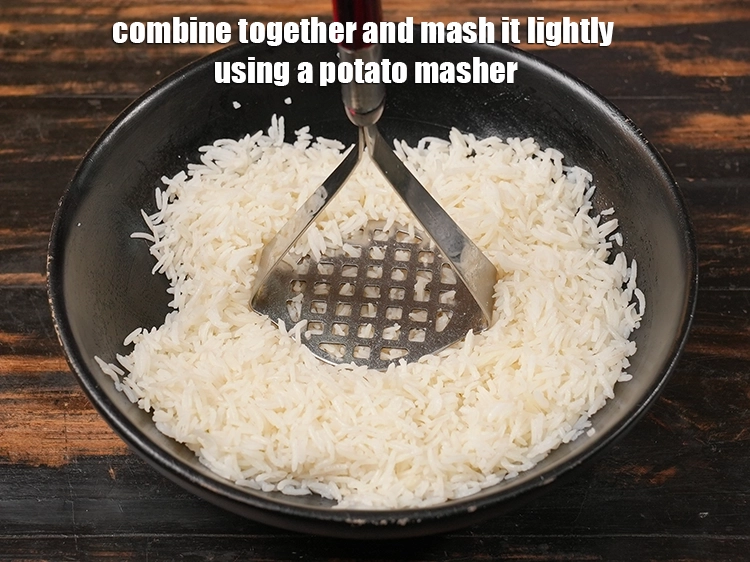 Step 4 – <p>Combine together and mash it lightly using a potato masher. If the rice isn’t mashed …